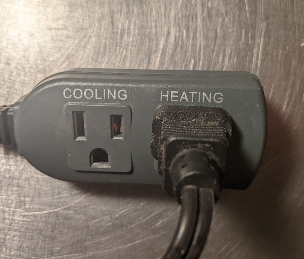 heating mat plugged into temperature controller